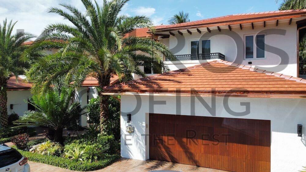 South Florida home with clay tile roofing services by Kairos Roofing