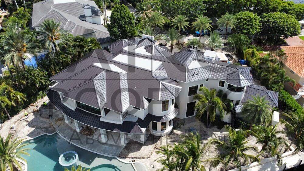 large Florida mansion with metal roof replacement by Kairos Roofing