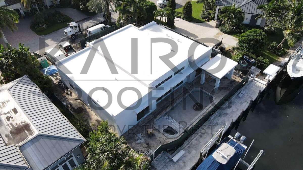 new home construction in south florida with flat roofing by Kairos