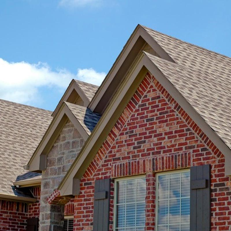 asphalt shingle roof on brick home